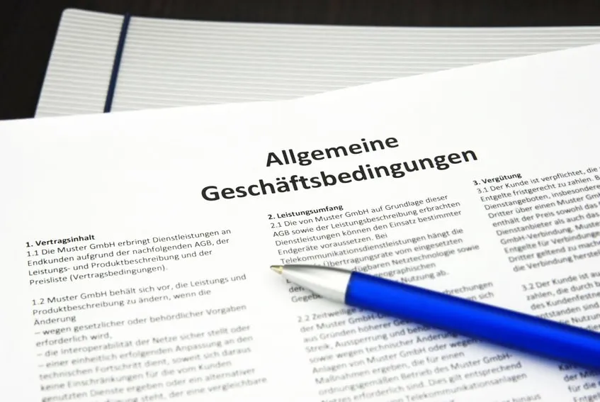 AGB blauer Kugelschreiber Allgemeine Geschäftsbedingungen mit blauem Kugelschreiber darauf